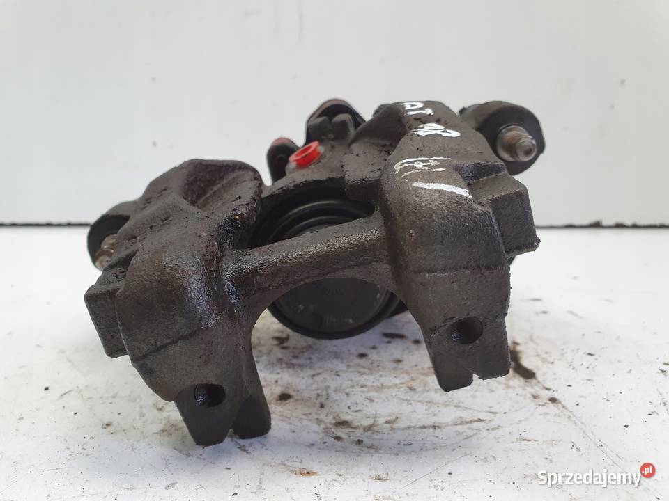 VW Passat B8 TYLNY ZACISK HAMULCOWY LEWY tył Zaciski i jarzma Chełm