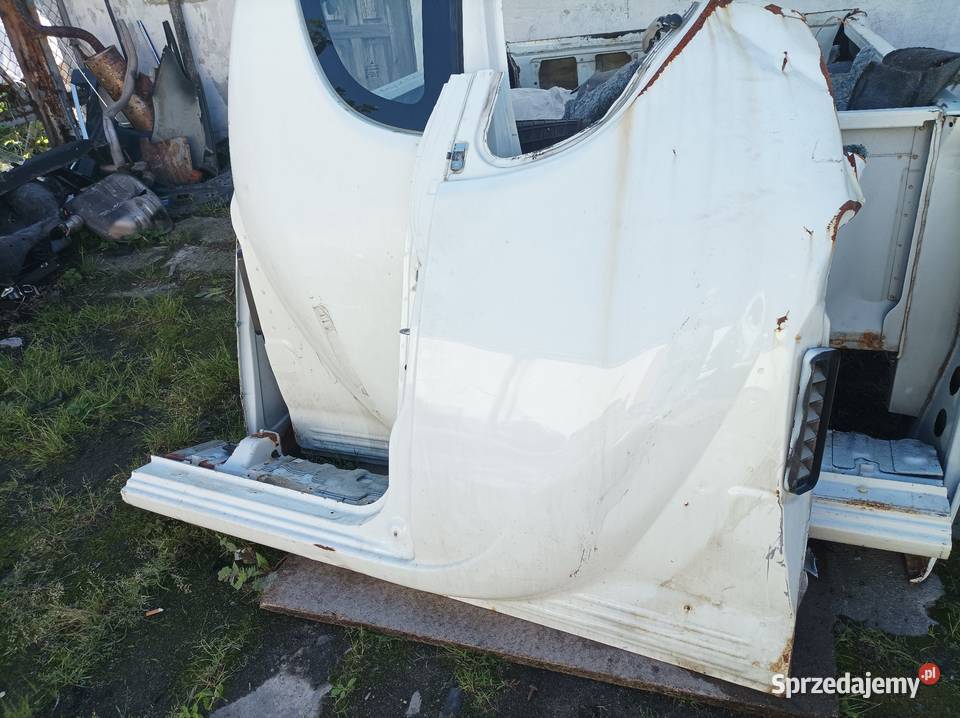 Mitsubishi L200 błotnik tylny lewy z progiem Lublin