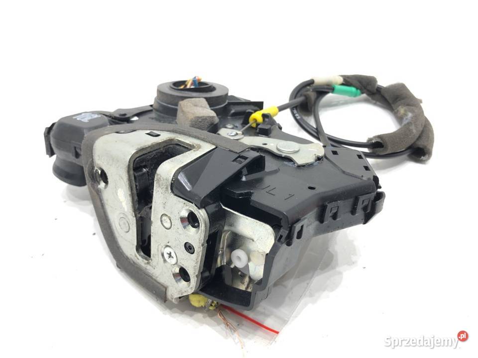 ZAMEK DRZWI LEWY PRZÓD TOYOTA COROLLA E13 Motoryzacja