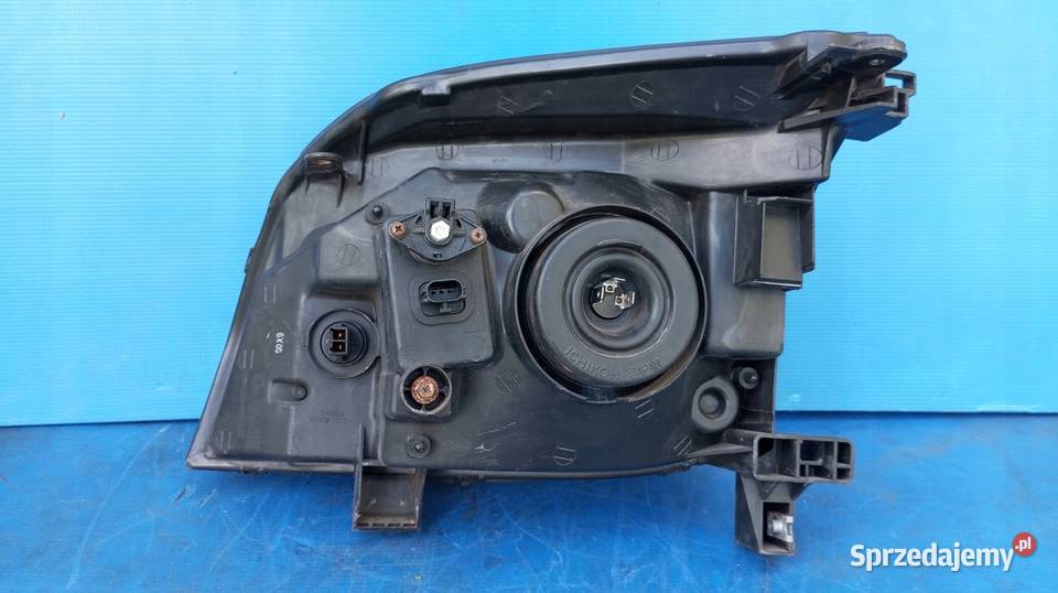 LAMPA REFLEKTOR PRAWY PRZÓD EU ORYGINAŁ NISSAN