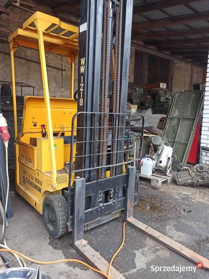 Wózek elektryczny widłowy żółty WDT 38409392 Skierniewice