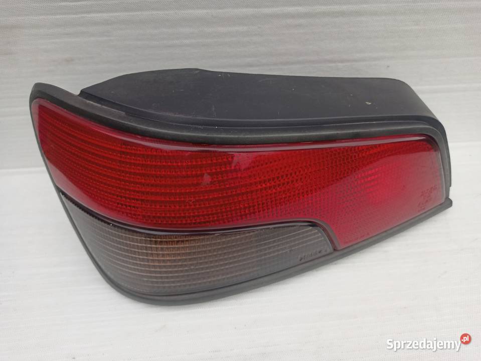 Peugeot 306 lampa tył tylna lewa wkład Sieradz