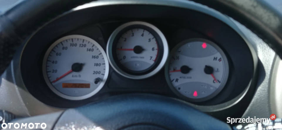 Toyota RAV4 niebieski metalik stan Malinowo