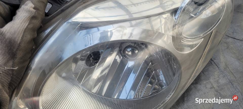 SUZUKI ALTO 0914 LEWY REFLEKTOR LAMPA LEWA PRZOD