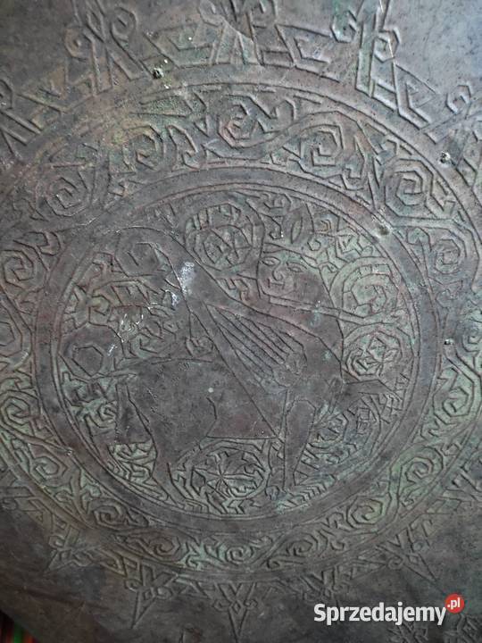 Wizerunek Gryfa z ludzką głową w koronie Białystok