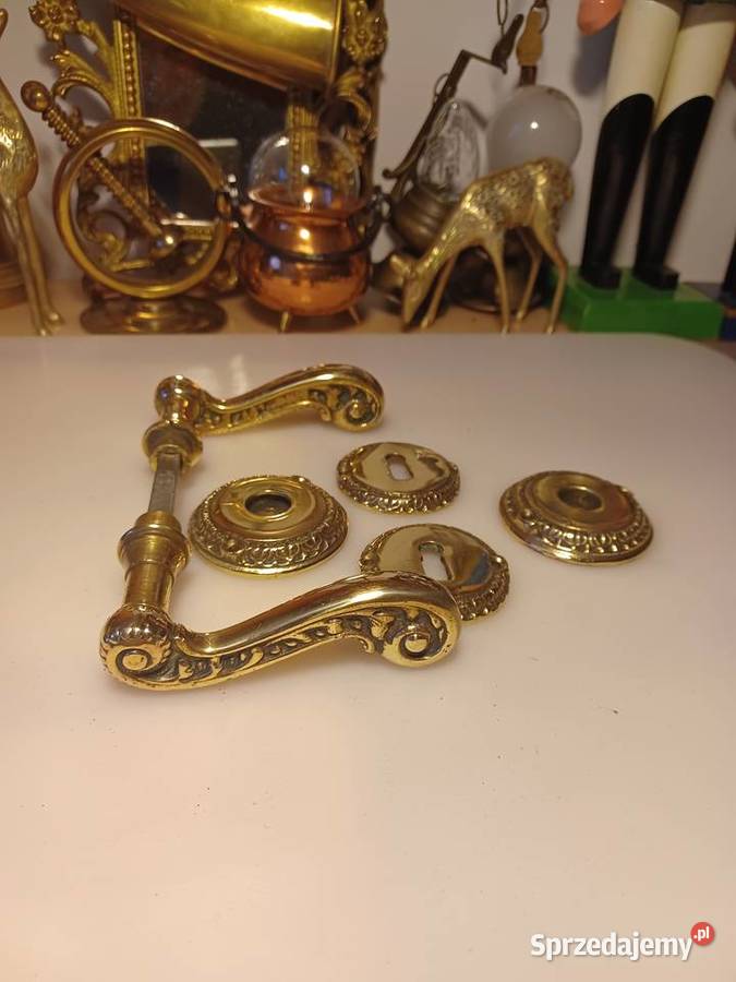 Mosiężne klamki z rozetami