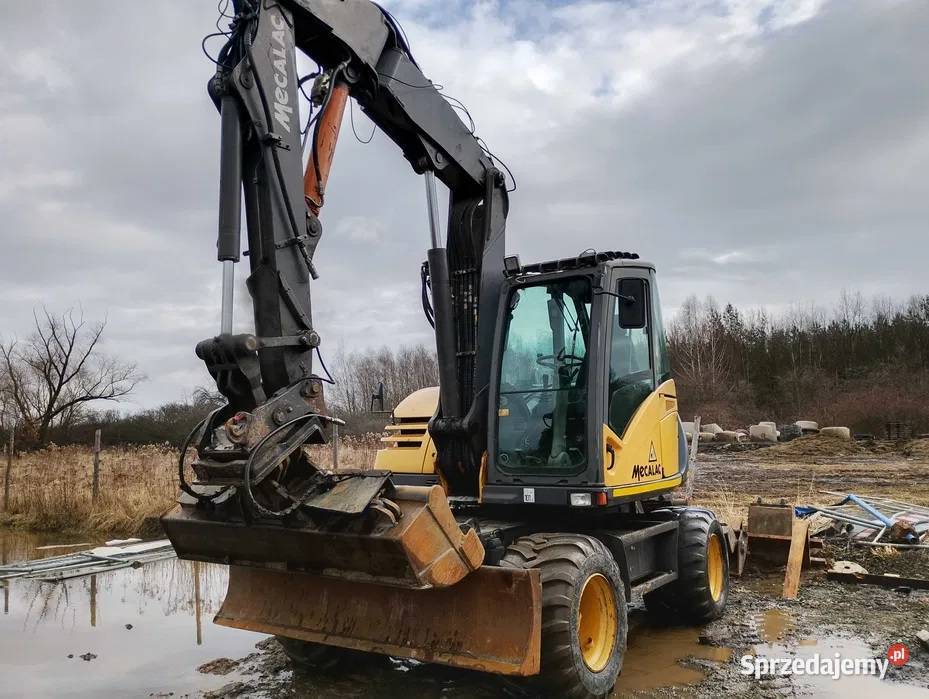 Usługi Koparką kołową Mecalac 714MW Roboty Wrocław
