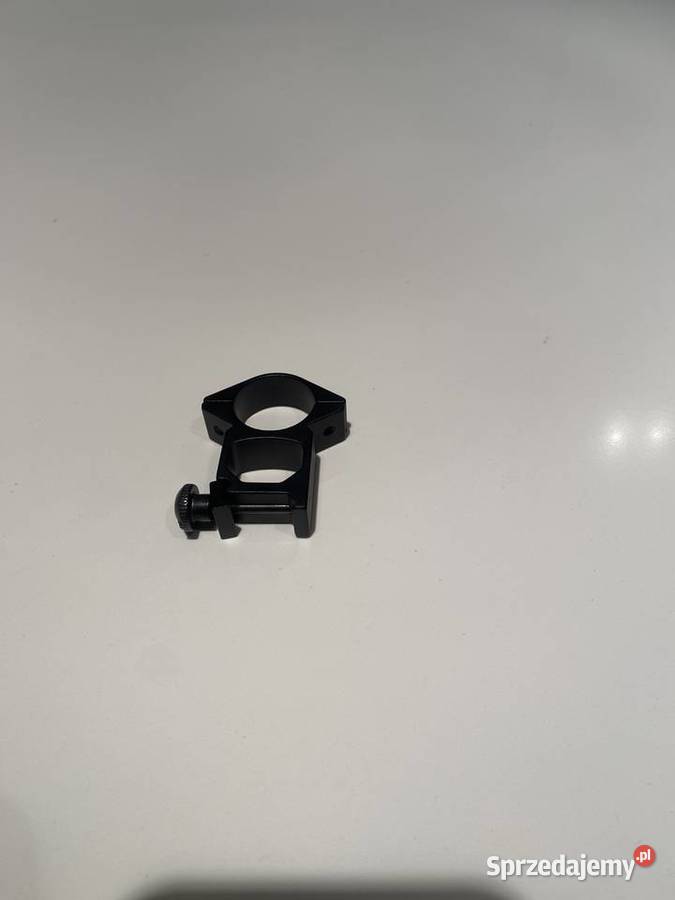 Uchwyt doswietlacza na szynę pica tini