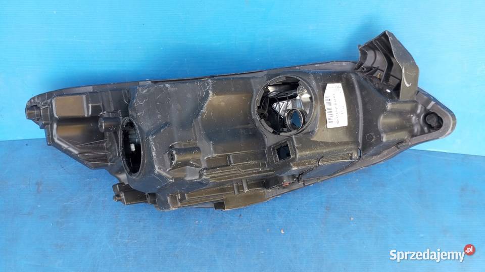 LAMPA LEWY PRZÓD REFLEKTOR EU XENON OPEL ASTRA