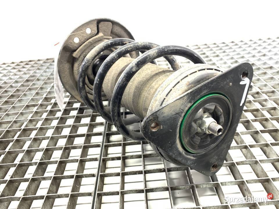 AMORTYZATOR LEWY PRZÓD ZE SPRĘŻYNĄ RENAULT osobowe podkarpackie