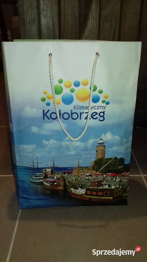 Kołobrzeg ulotki mapy pocztówki pamiątki z zachodniopomorskie