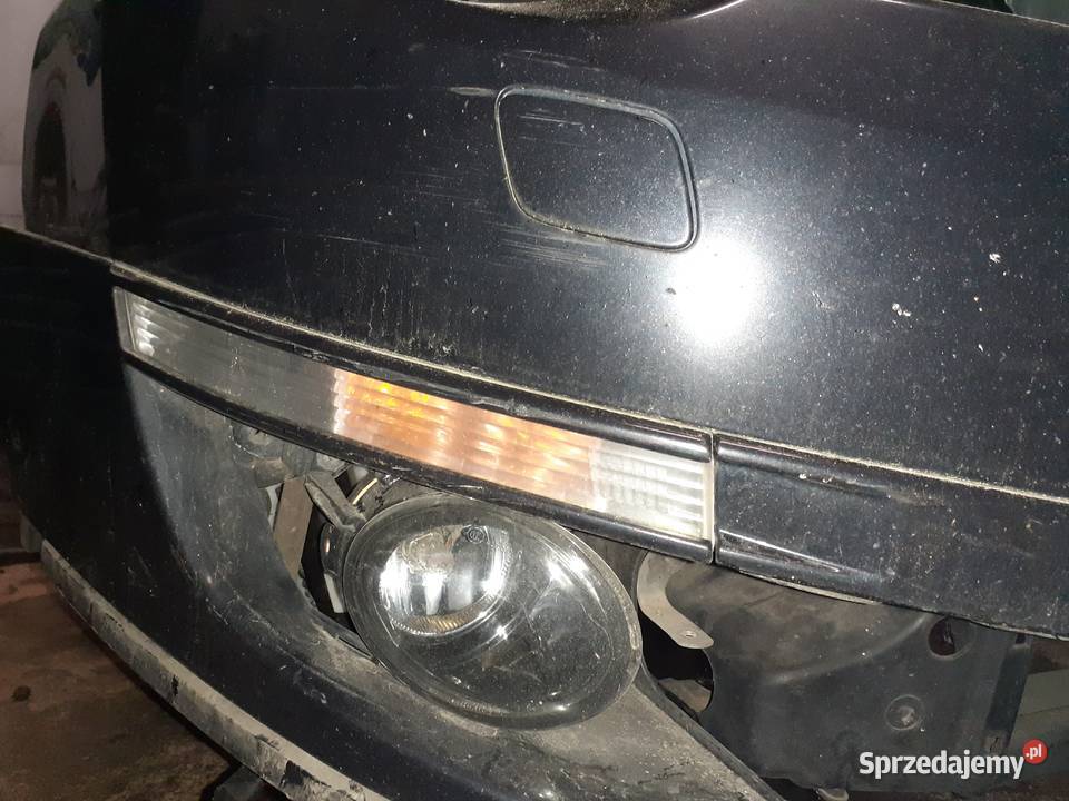 Fotele kanapa skóra jasno szara kombi passat B6 Części samochodowe Nisko