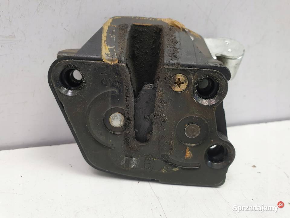 ZAMEK DRZWI lewy TYŁ Kia Carnival I TYLNY Rudka