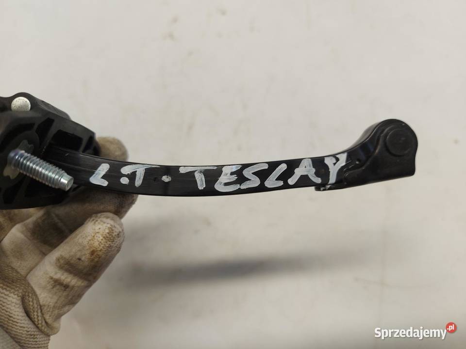 TESLA MODEL Y 2023r Ogranicznik drzwi tył lewy Ograniczniki drzwi