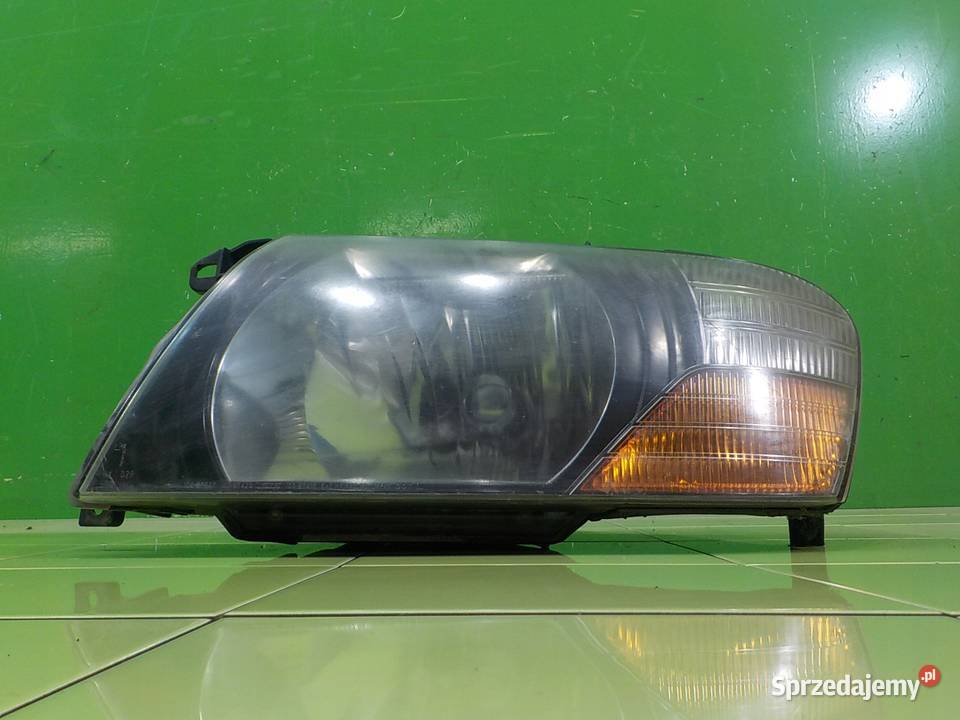 MITSUBISHI PAJERO III 35 B 01r 5D lampa lewa Lampy przednie
