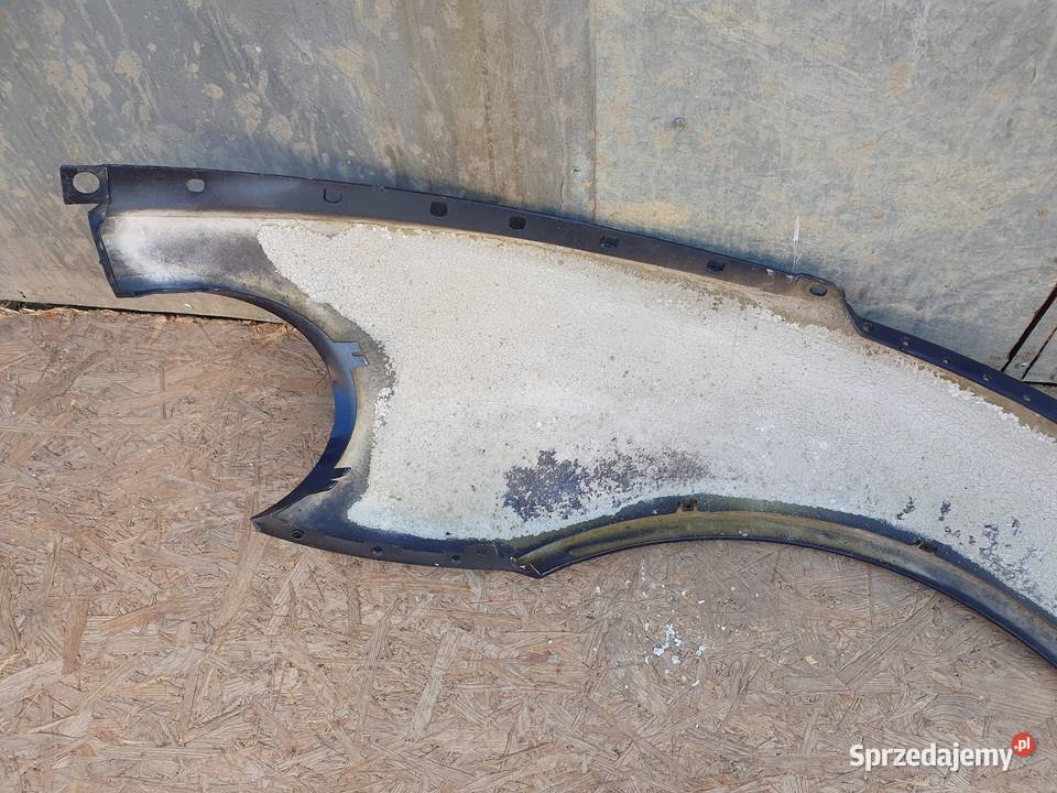 VW BEETLE 1C0 BŁOTNIK PRAWY PRZÓD 1C0821106F Międzychód