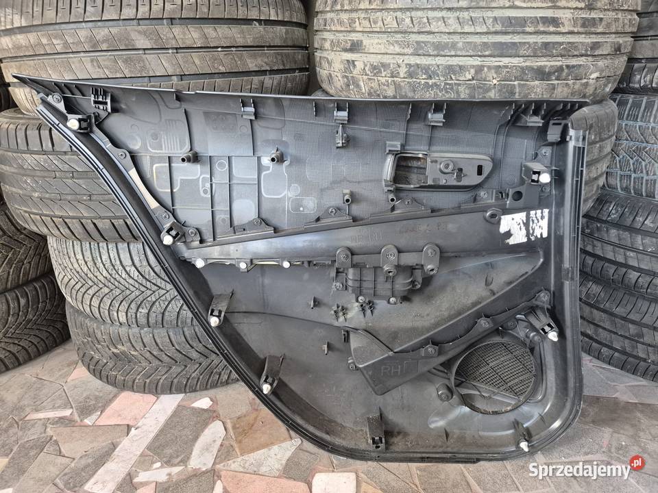 Boczek drzwi tylnych prawy Toyota Corolla E21 Osłony i zaślepki łódzkie Łódź