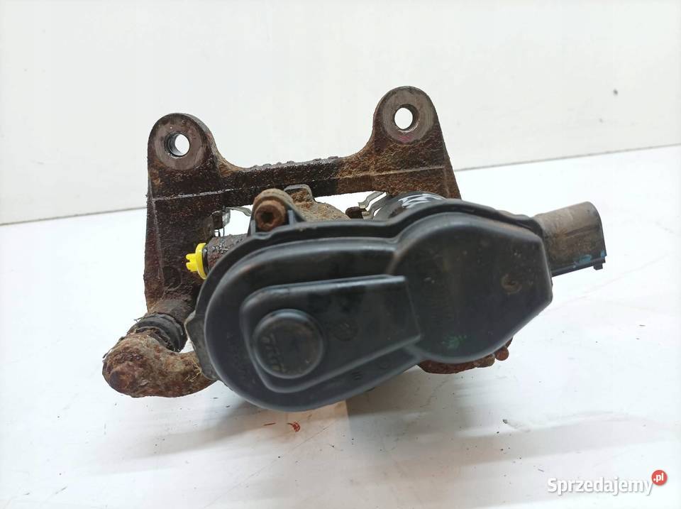 ZACISK HAMULCOWY PRAWY TYŁ 32 B KL Jeep Cherokee