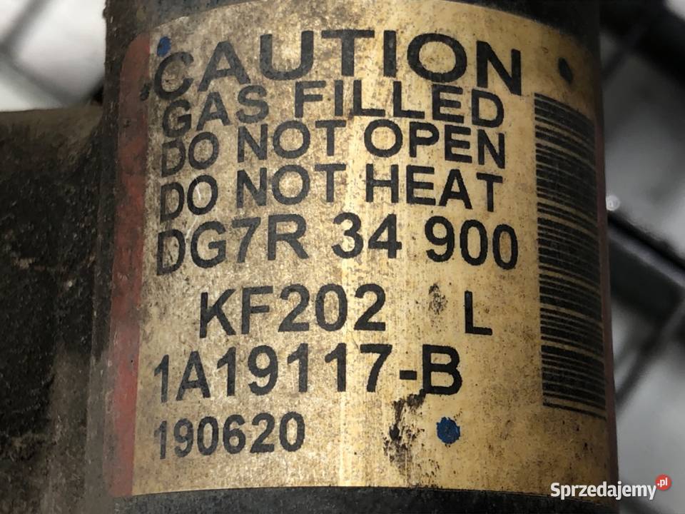 AMORTYZATOR LEWY PRZÓD SPRĘŻYNA MAZDA 2 DL 15 osobowe