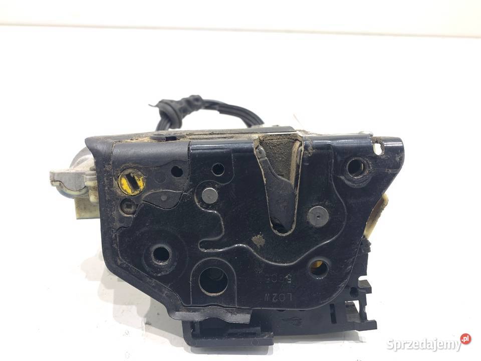 ZAMEK DRZWI LEWY TYŁ VW PASSAT B6 Kombi