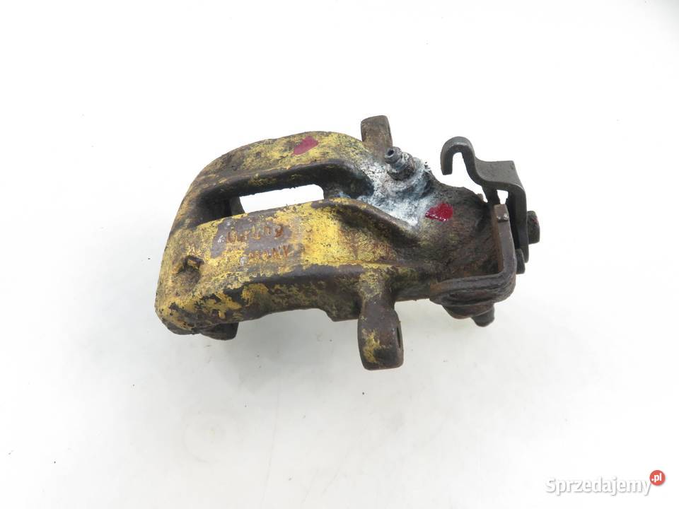 ZACISK LEWY TYŁ AUDI 80 B4 19