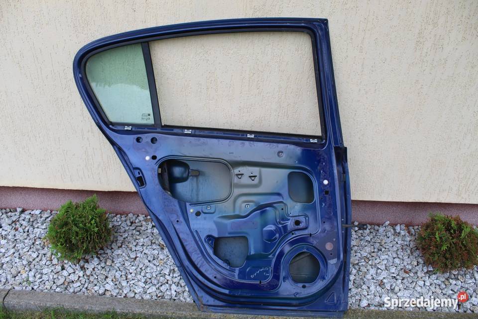 DRZWI LEWY TYŁ Z21B OPEL ASTRA H HB 5D
