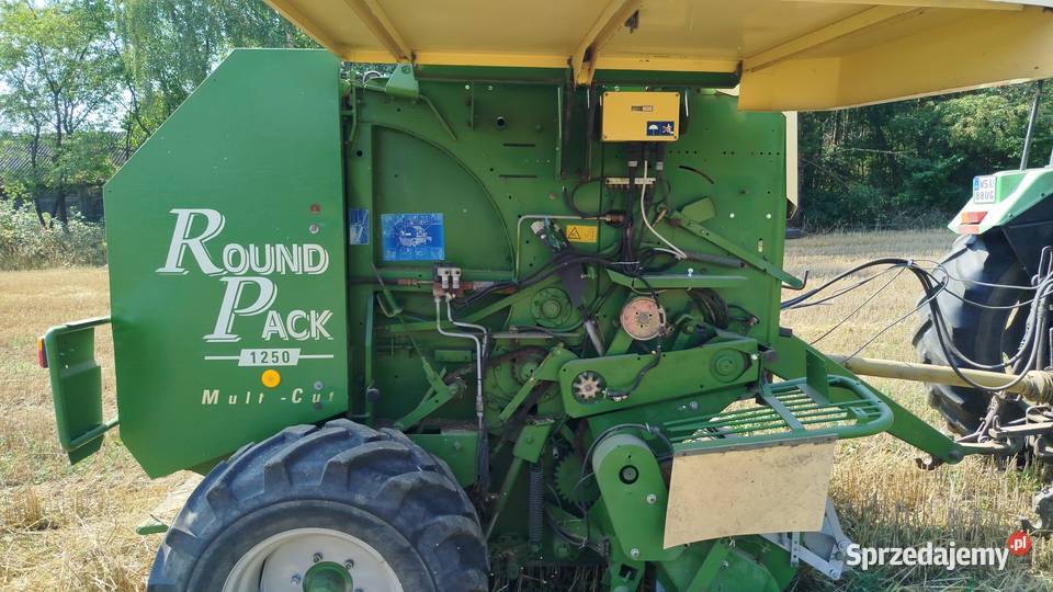 Prasa Krone 1250 Round Pack Multi cut Rolujące (belujące)