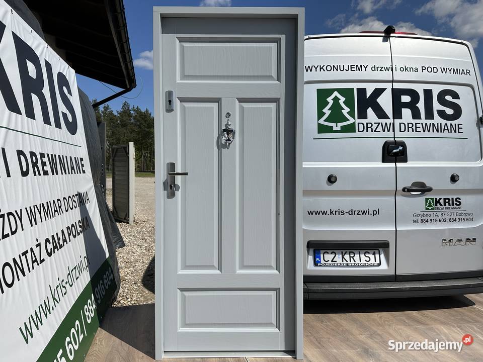 Drzwi zewnętrzne wewnątrzklatkowe drewniane Na Grzybno sprzedam