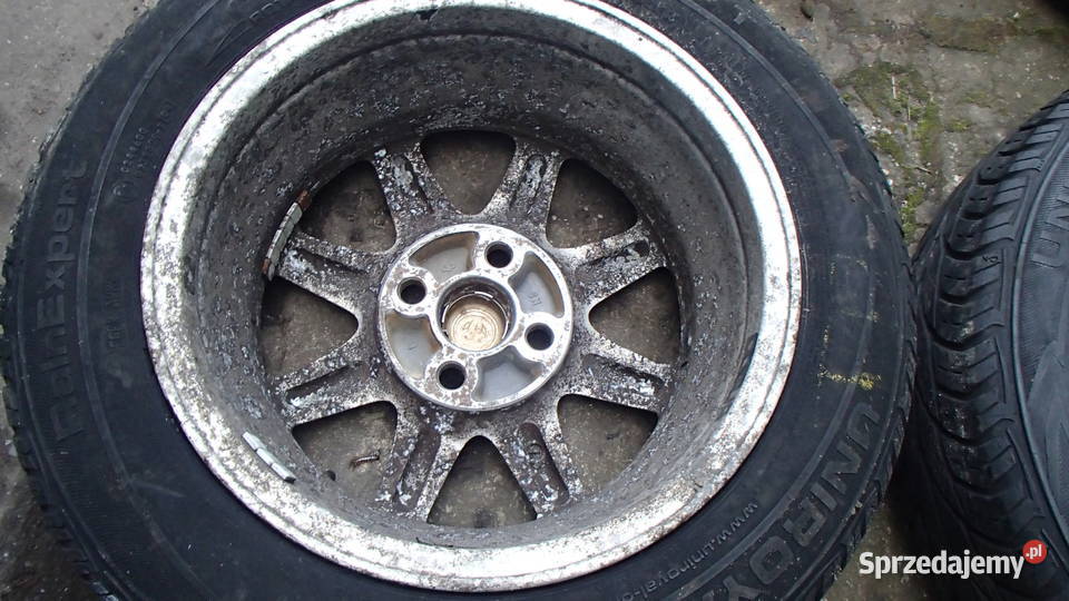 Alu felgi Toyota OEM 4x10014x6JJ osobowe Deski rozdzielcze, konsole Katowice