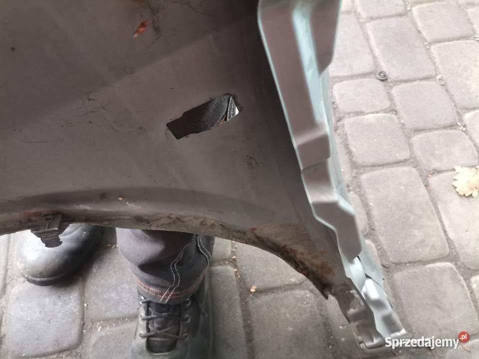 NISSAN PRIMERA P12 BŁOTNIK PRAWY PRZEDNI KY0G