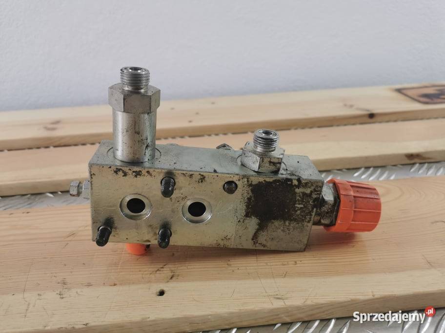 Holland LM 5080 Zamek cylindra wysypu Wilkowo sprzedam