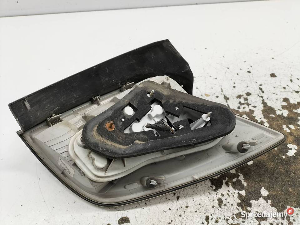 LAMPA TYŁ LEWA EU KOMBI 13223675 Opel Astra III