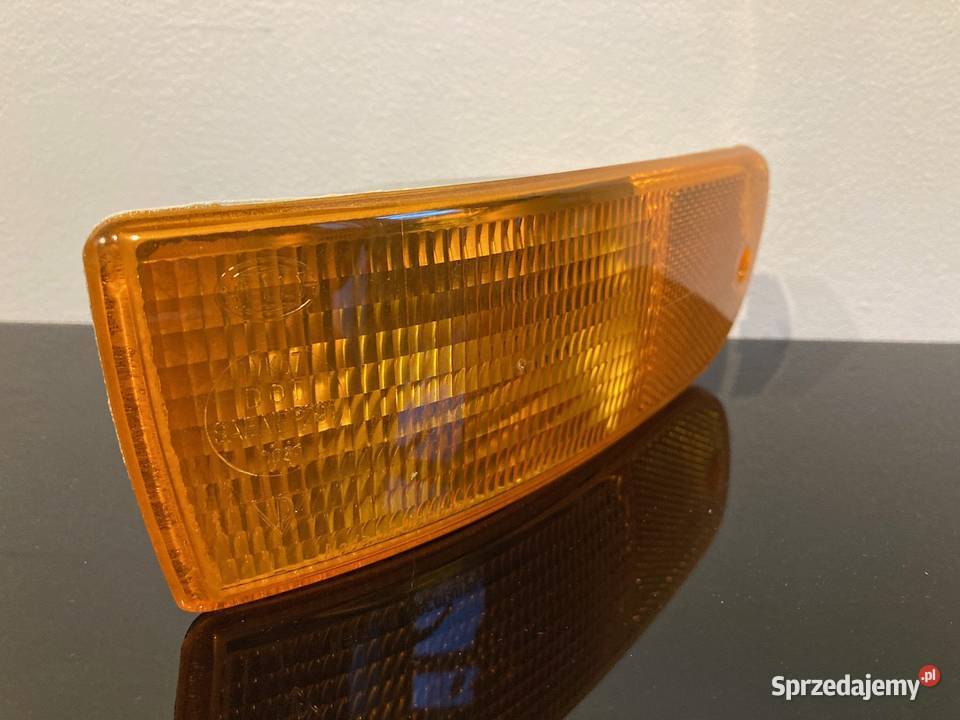 Kierunkowskaz Porsche 911 lewy pomarańczowy 993 Rok produkcji 1994 Części samochodowe Poznań sprzedam