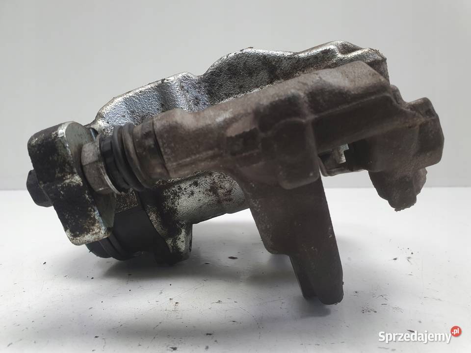 Toyota Yaris IV TYLNY ZACISK HAMULCOWY lewy tył Wyposażenie wnętrza lubelskie Chełm