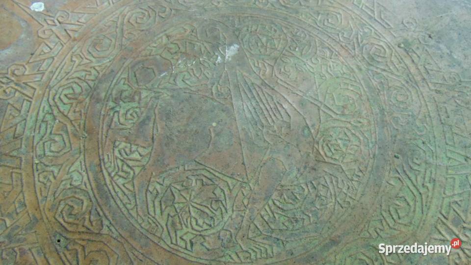 Wizerunek Gryfa z ludzką głową w koronie Białystok