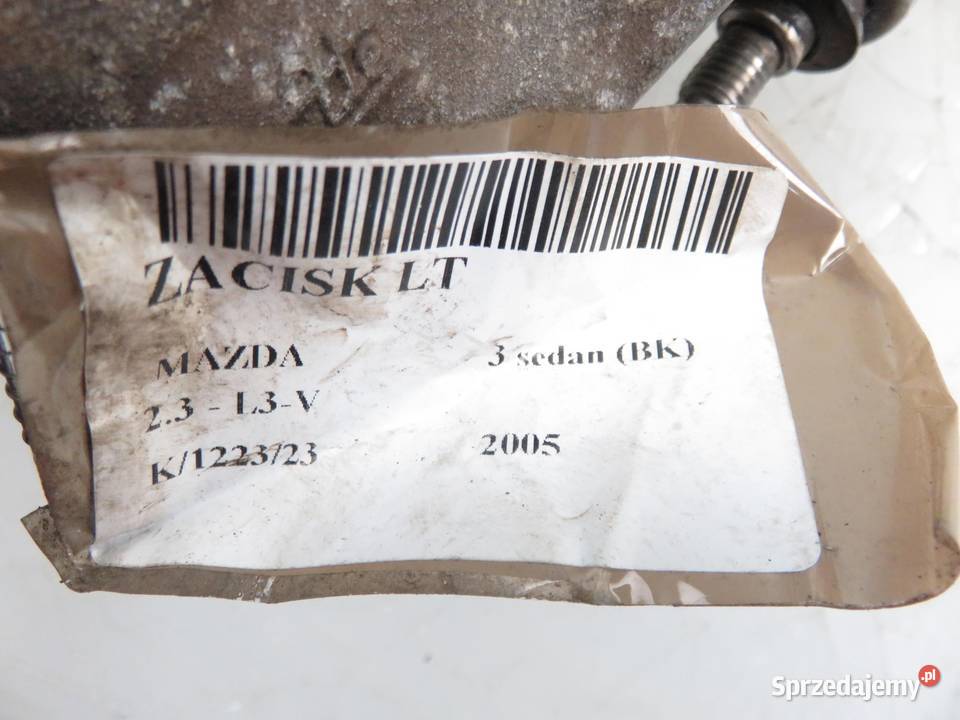 ZACISK LEWY TYŁ MAZDA 3 sedan BK 23 małopolskie