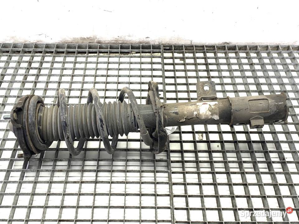 AMORTYZATOR LEWY PRZÓD ZE SPRĘŻYNĄ KIA SPORTAGE