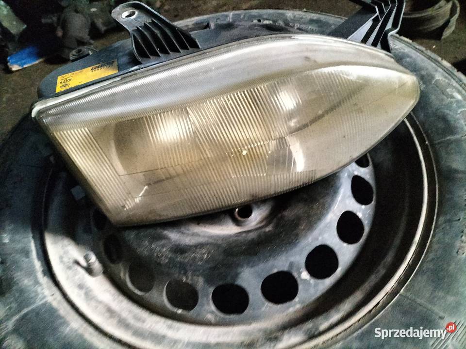 Lampa prawy przód Fiat Siena Palio 46537111 Kamień