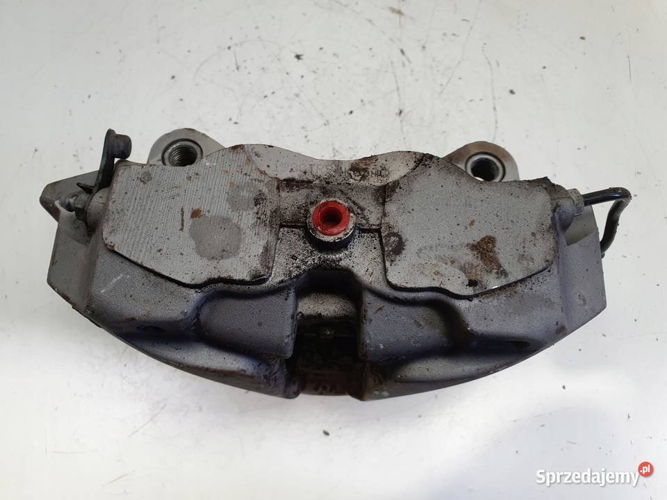 Audi A4 B9 PRZEDNI ZACISK HAMULCOWY lewy przód osobowe Rudka