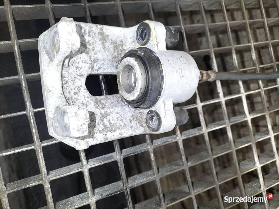 Zacisk hamulcowy prawy tylny BMW E39 SEDAN Poręba