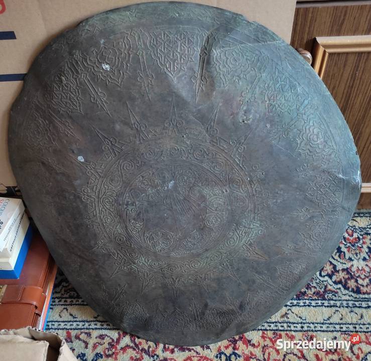 Wizerunek Gryfa z ludzką głową w koronie Białystok