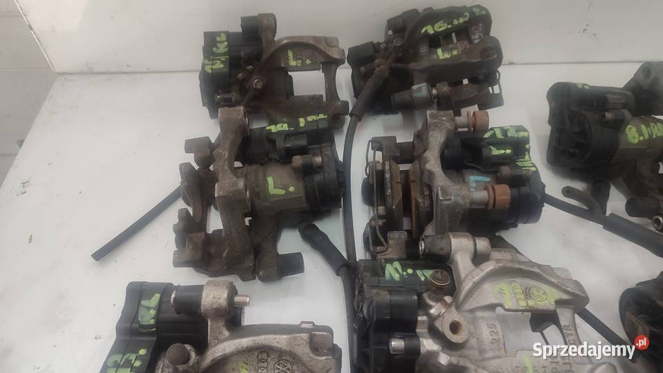 ZACISK HAMULCOWY PRAWY LEWY TYŁ AUDI 5Q0615406B Zaciski i jarzma Motoryzacja sprzedam