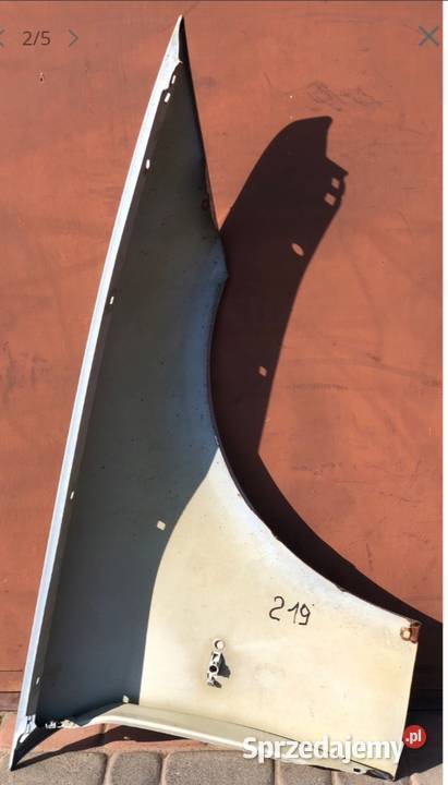 BŁOTNIK LEWY PRZEDNI BMW E90 E91 kolor nie znany