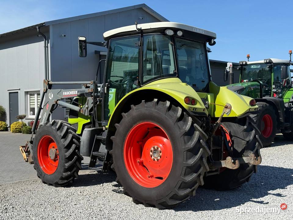 Claas Arion 510 z ładowaczem