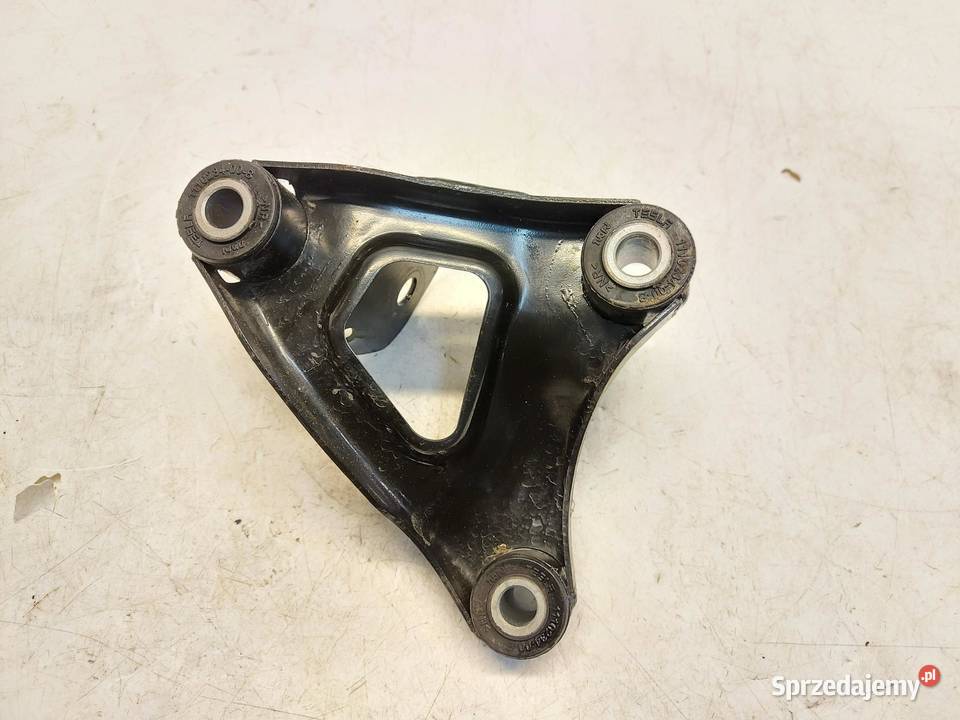 TESLA MODEL Y 2022r ŁAPA UCHWYT MOCOWANIE LEWE