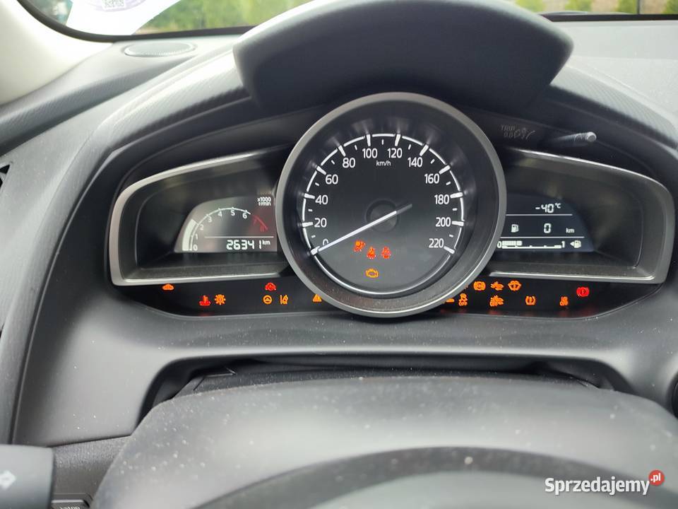 Mazda 2 Homura 15 BenzynaMiękka Hybryda Mega