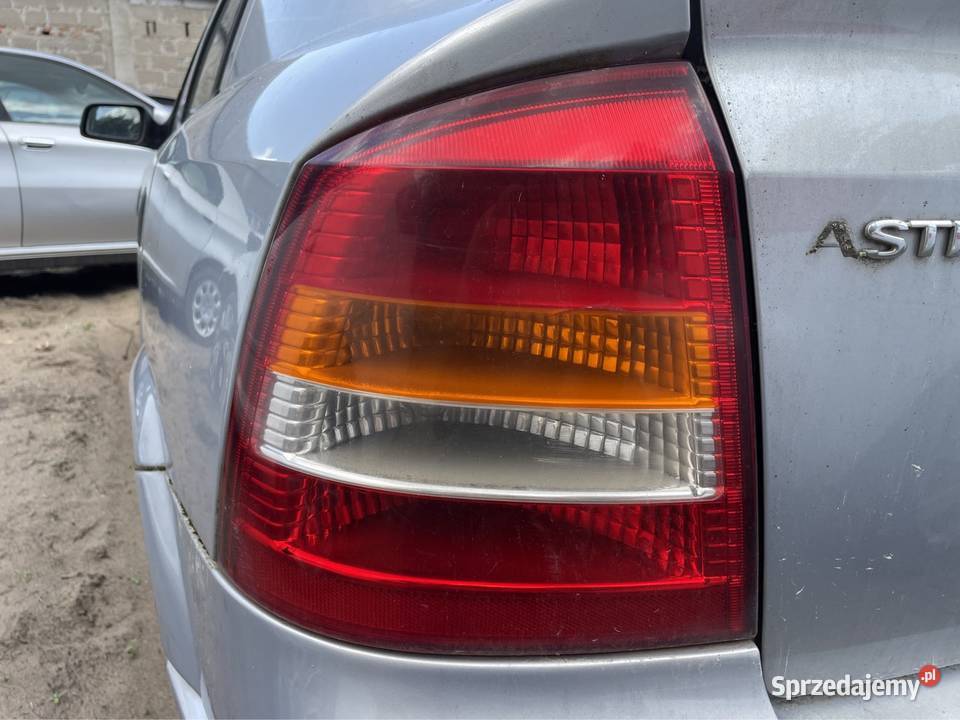 LAMPA LEWA TYŁ OPEL ASTRA II G 5d HB lewe Lampy tylne Zambrów