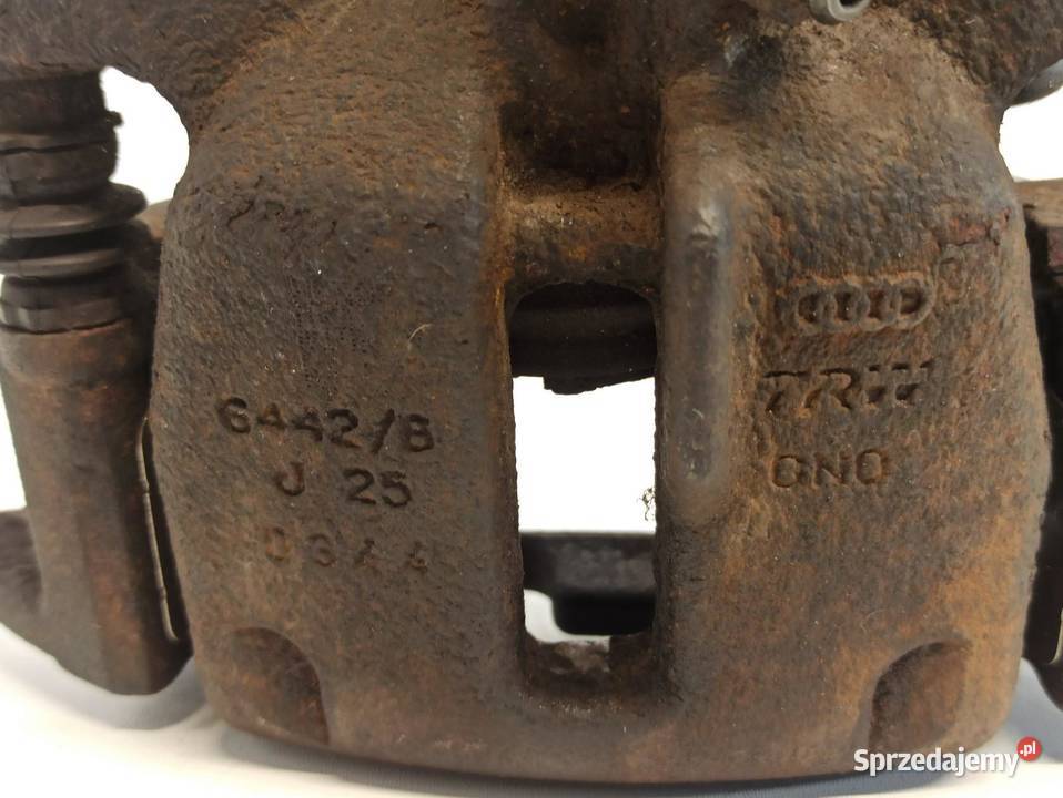 AUDI AA4 B8 ZACISK HAMULCOWY LEWY TYŁ 8K0615403E
