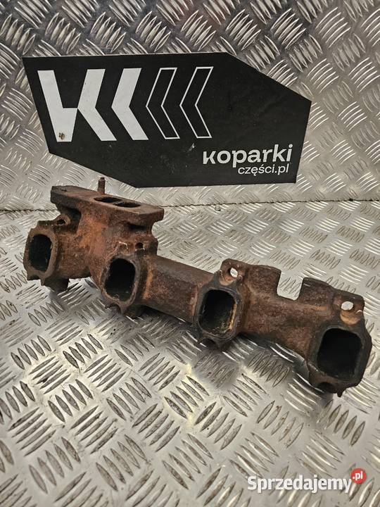 Kolektor wydechowy CASE 580 SLE SM K SK