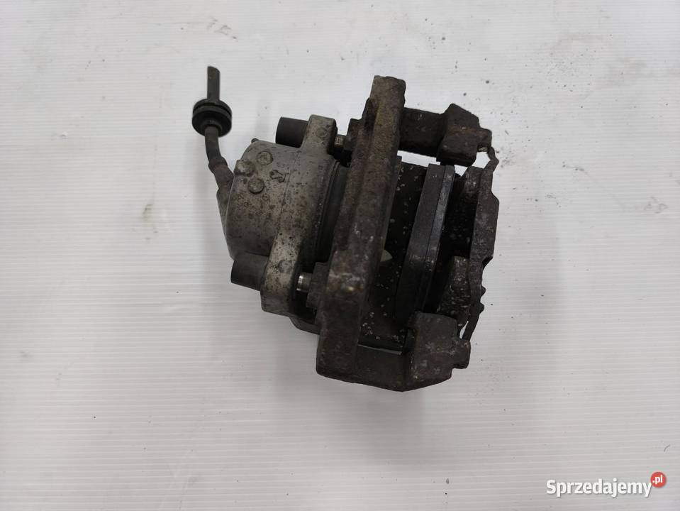 ZACISK LEWY PRZÓD KOMPLETNY BMW E90 E91